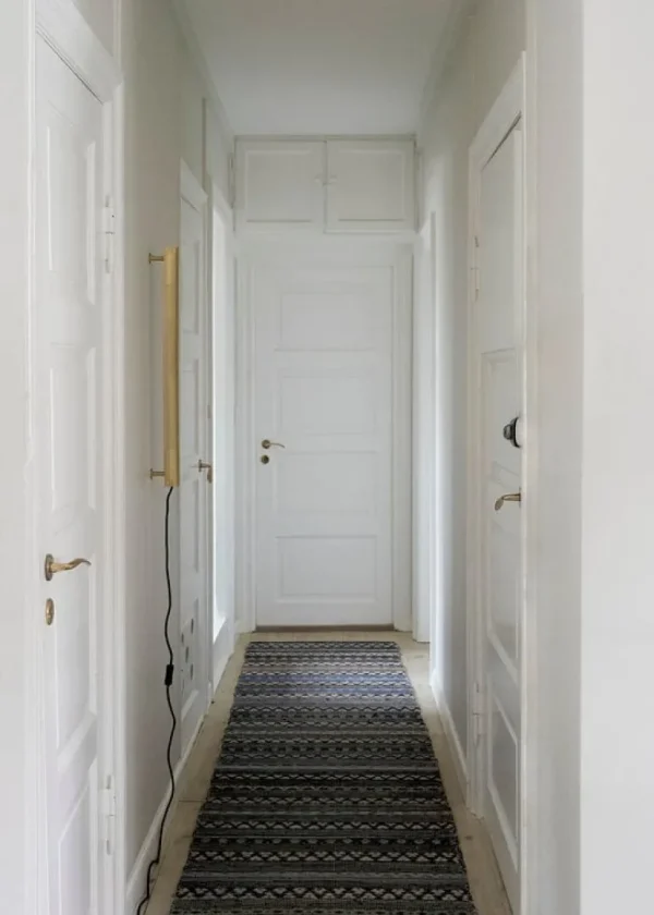 NUAD Radent vägglampa 70 cm, mässing