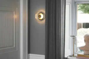 Nuura Blossi vägg-/taklampa, Nordic gold - klar